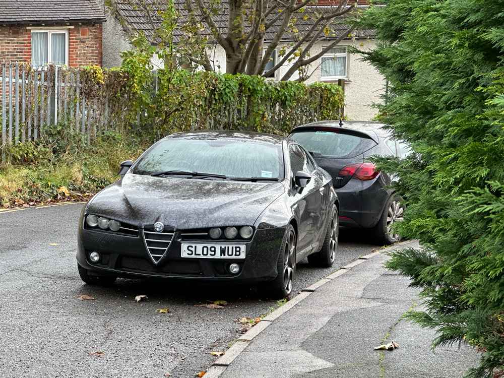 Photograph of SL09 WUB - a Black Alfa Romeo Brera parked in Hollingdean by a non-resident. The tenth of twenty-six photographs supplied by the residents of Hollingdean.