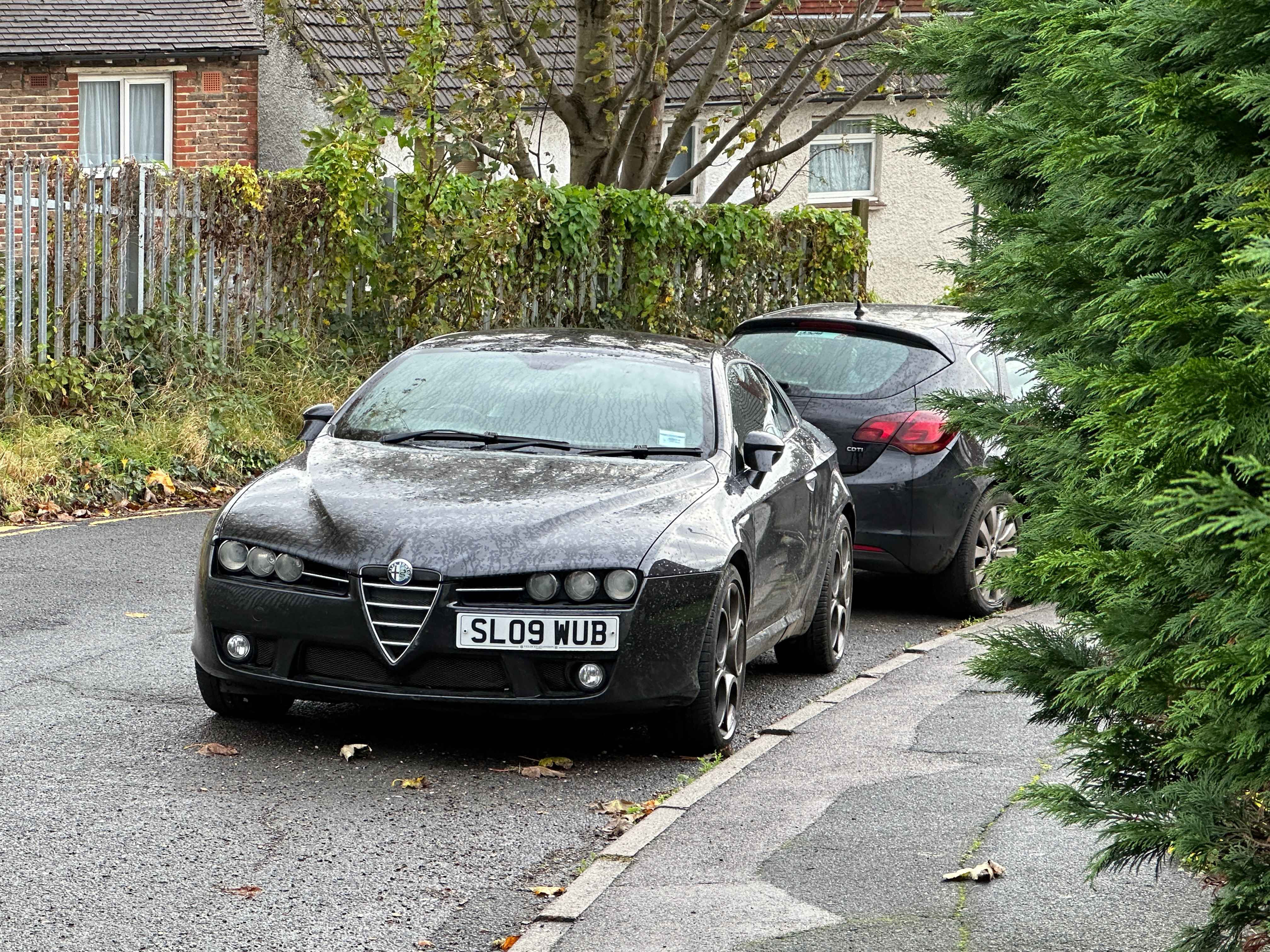 Photograph of SL09 WUB - a Black Alfa Romeo Brera parked in Hollingdean by a non-resident. The tenth of twenty photographs supplied by the residents of Hollingdean.