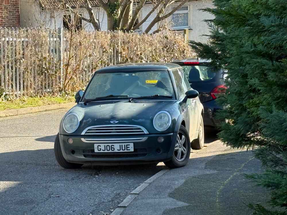 Photograph of GJ06 JUE - a Green Mini Cooper parked in Hollingdean by a non-resident. The nineteenth of twenty photographs supplied by the residents of Hollingdean.