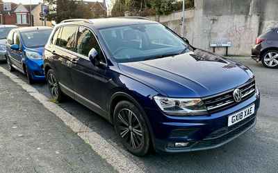 GX18 XAE, a Blue Volkswagen Tiguan parked in Hollingdean