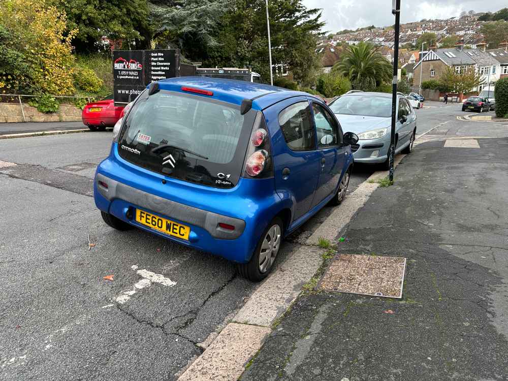 Photograph of FE60 WEC - a Blue Citroen C1 parked in Hollingdean by a non-resident. The sixth of thirteen photographs supplied by the residents of Hollingdean.