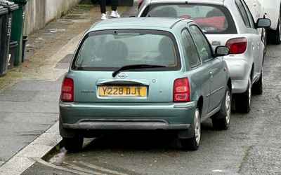 Y228 DJT, a Green Nissan Micra parked in Hollingdean