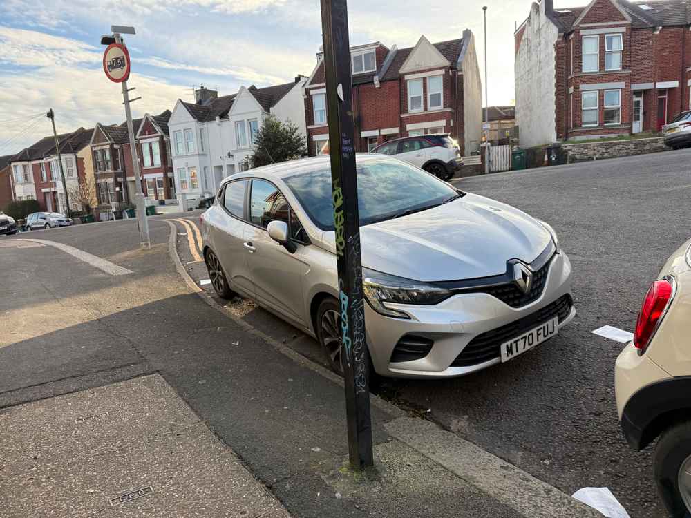 Photograph of MT70 FUJ - a Silver Renault Clio parked in Hollingdean by a non-resident. The second of three photographs supplied by the residents of Hollingdean.