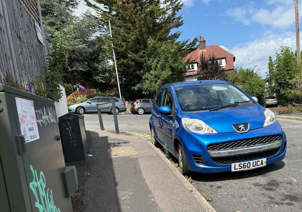 Photograph of LS60 UCA - a Blue Peugeot 107 parked in Hollingdean by a non-resident. The twenty-fifth of thirty photographs supplied by the residents of Hollingdean.