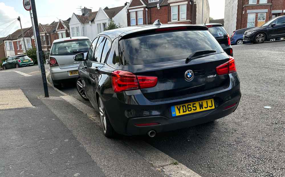 Photograph of YD65 WJJ - a Black BMW 1 Series parked in Hollingdean by a non-resident. 