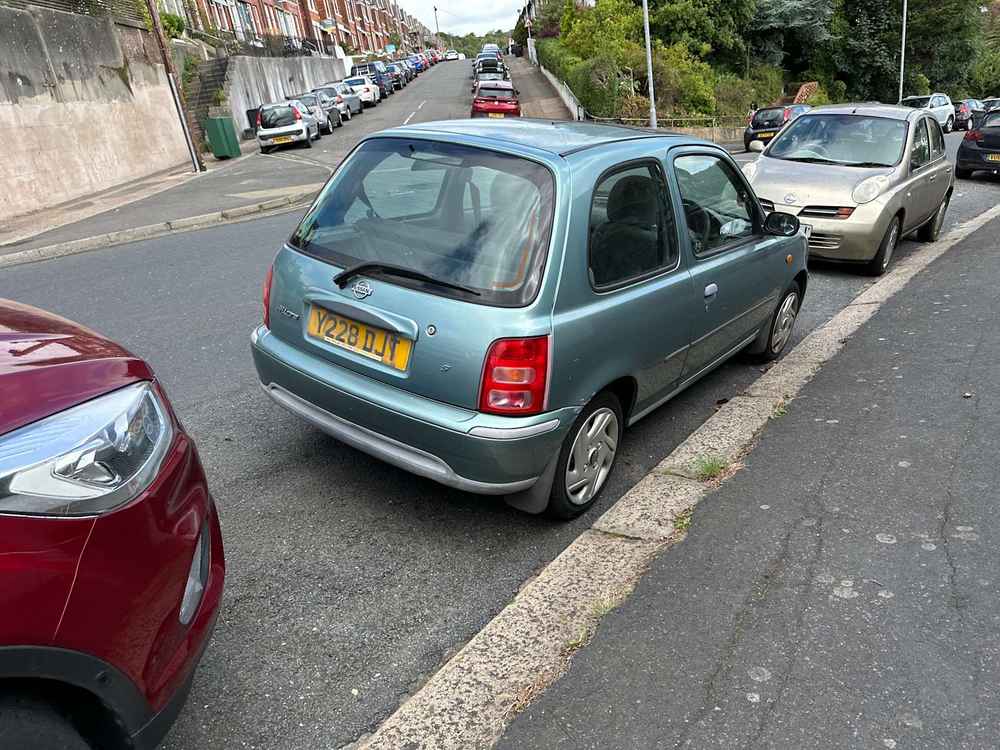 Photograph of Y228 DJT - a Green Nissan Micra parked in Hollingdean by a non-resident, and potentially abandoned. The third of nine photographs supplied by the residents of Hollingdean.