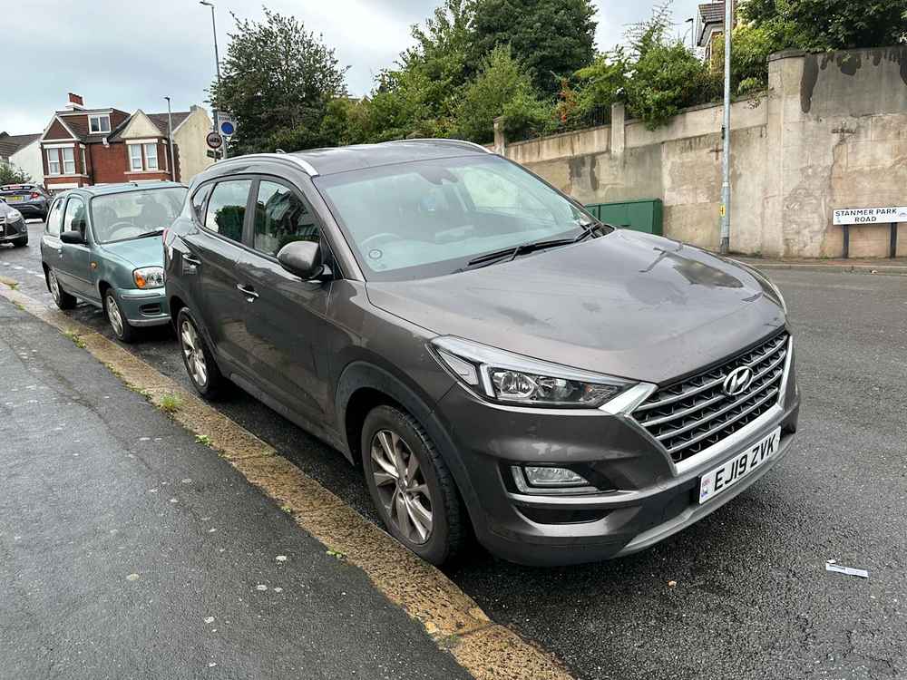 Photograph of EJ19 ZVK - a Brown Hyundai Tucson parked in Hollingdean by a non-resident. 