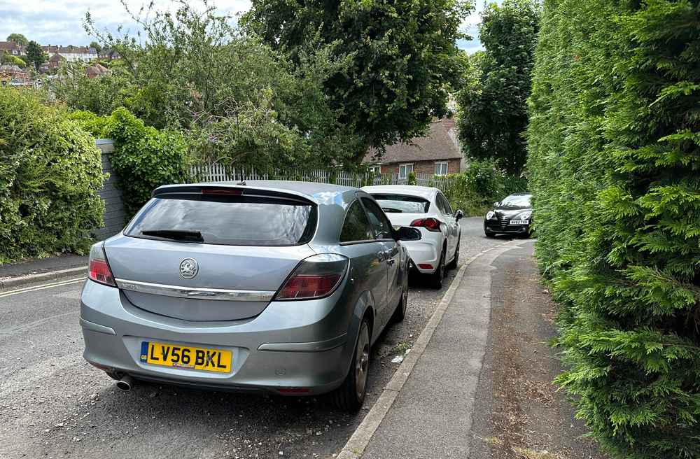 Photograph of LV56 BKL - a Blue Vauxhall Astra parked in Hollingdean by a non-resident, and potentially abandoned. The fifth of five photographs supplied by the residents of Hollingdean.