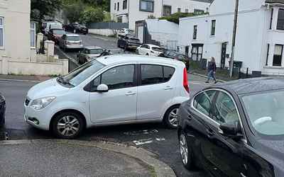 HJ12 KVX, a White Vauxhall Agila parked in Hollingdean