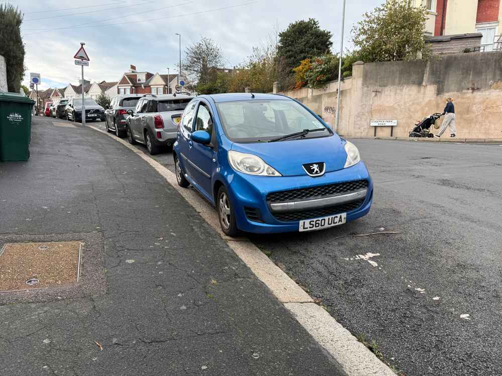 Photograph of LS60 UCA - a Blue Peugeot 107 parked in Hollingdean by a non-resident. The twenty-seventh of twenty-seven photographs supplied by the residents of Hollingdean.