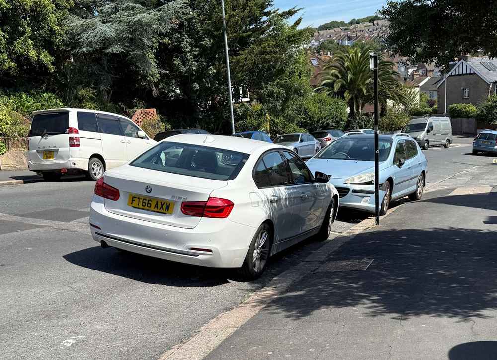 Photograph of FT66 AXW - a White BMW 3 Series parked in Hollingdean by a non-resident who uses the local area as part of their Brighton commute. The eighteenth of twenty-five photographs supplied by the residents of Hollingdean.