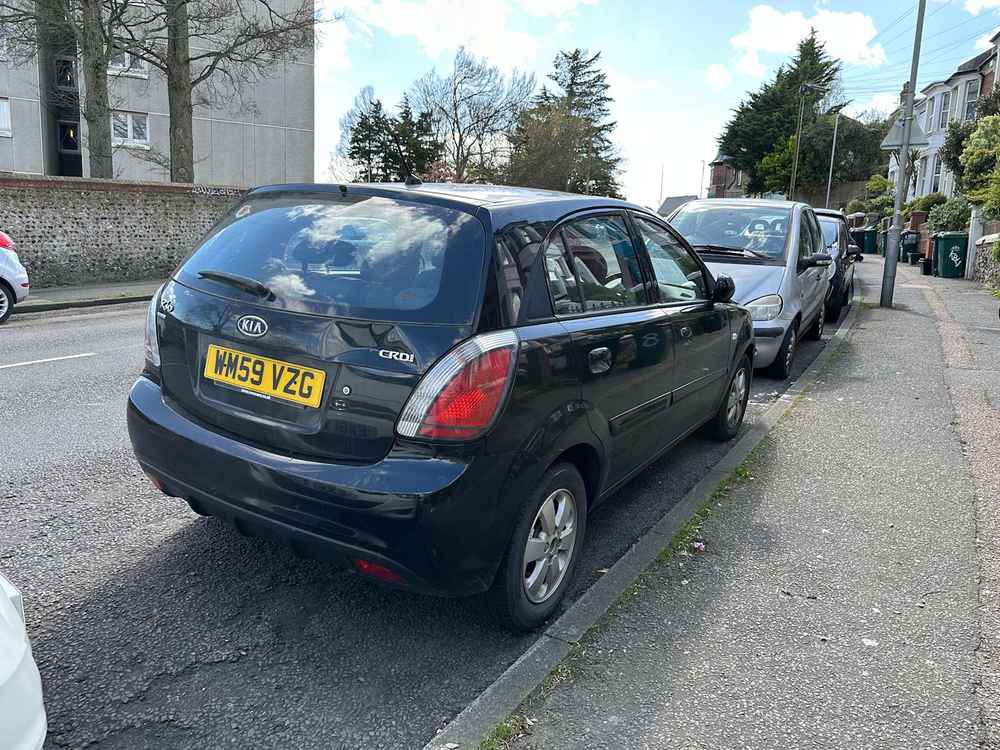 Photograph of WM59 VZG - a Black Kia Rio parked in Hollingdean by a non-resident. The seventh of nine photographs supplied by the residents of Hollingdean.