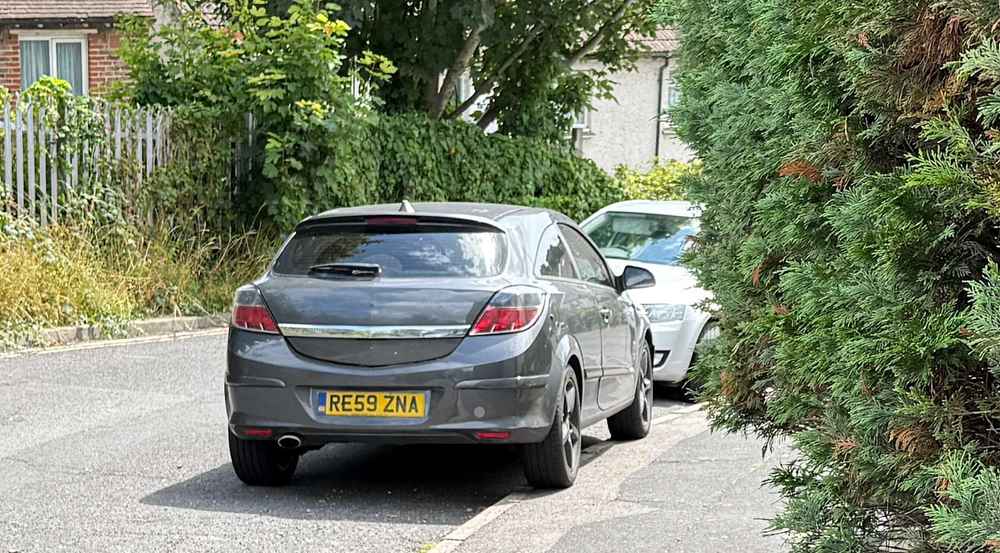 Photograph of RE59 ZNA - a Grey Vauxhall Astra parked in Hollingdean by a non-resident. The seventeenth of twenty-four photographs supplied by the residents of Hollingdean.