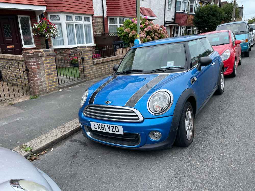 Photograph of LX61 YZO - a Blue Mini Cooper parked in Hollingdean by a non-resident. The second of two photographs supplied by the residents of Hollingdean.