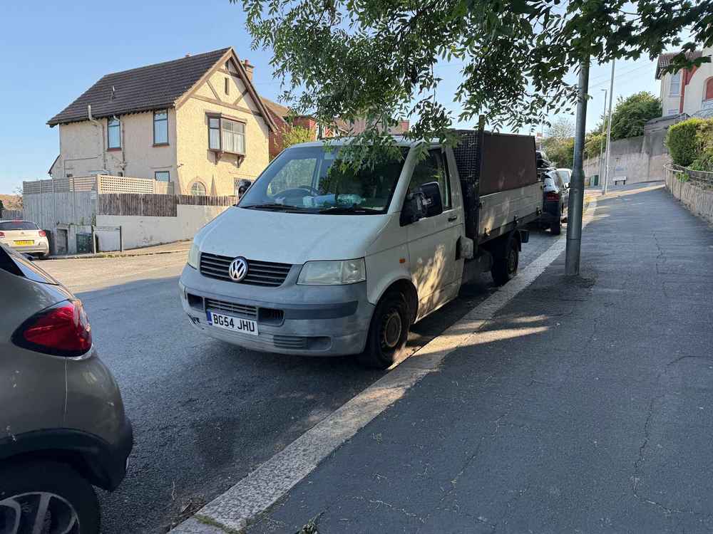 Photograph of BG54 JHU - a White Volkswagen T-Sporter parked in Hollingdean by a non-resident. The twenty-fourth of thirty-two photographs supplied by the residents of Hollingdean.