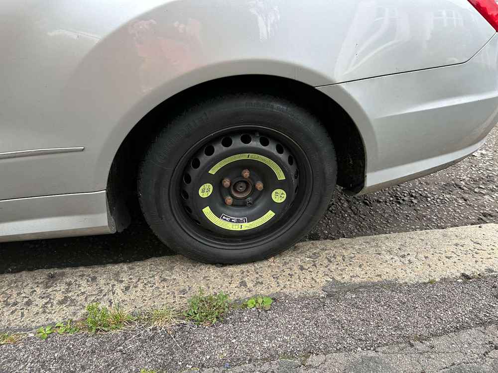 Photograph of ML61 AXH - a SIlver Mercedes E Class parked in Hollingdean by a non-resident, and potentially abandoned. The fourth of five photographs supplied by the residents of Hollingdean.