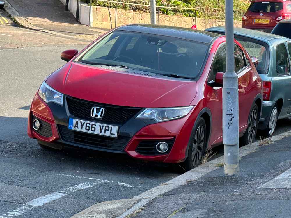 Photograph of AY66 VPL - a Red Honda Civic parked in Hollingdean by a non-resident. The fourth of five photographs supplied by the residents of Hollingdean.