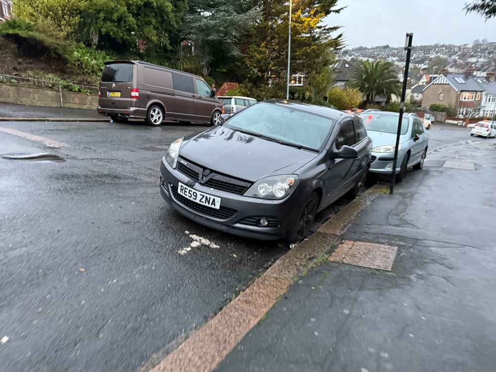 Photograph of RE59 ZNA - a Grey Vauxhall Astra parked in Hollingdean by a non-resident. The thirteenth of thirteen photographs supplied by the residents of Hollingdean.