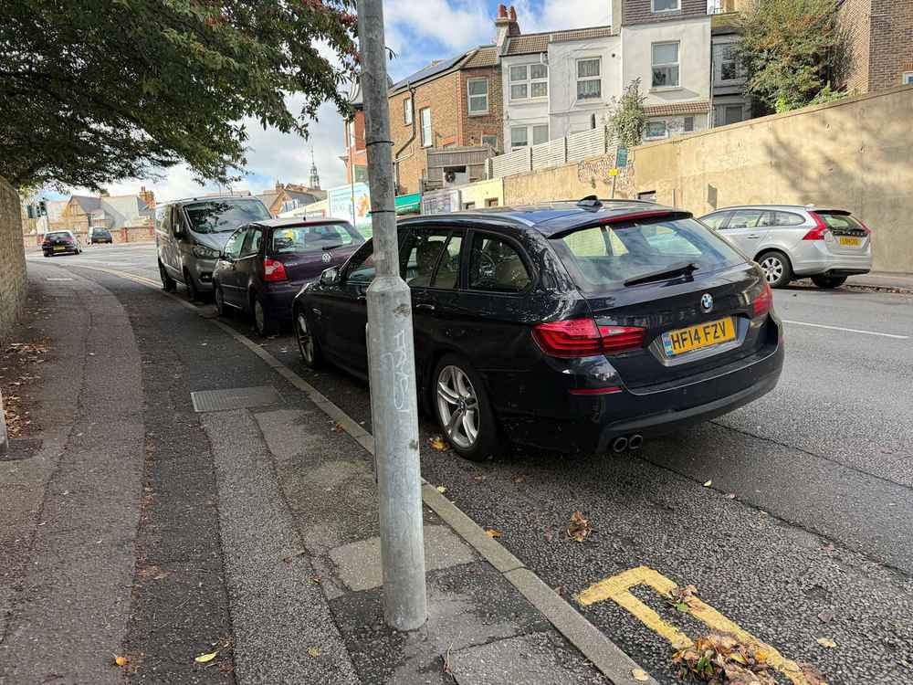 Photograph of HF14 FZV - a Black BMW 5 Series parked in Hollingdean by a non-resident, and potentially abandoned. The third of four photographs supplied by the residents of Hollingdean.