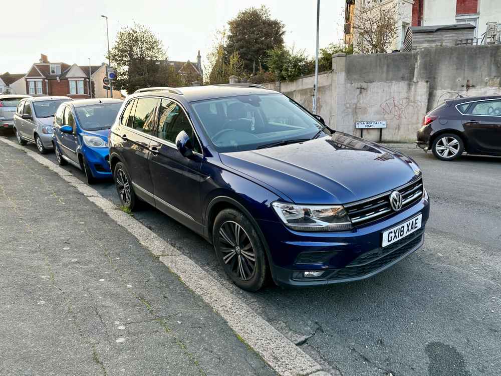 Photograph of GX18 XAE - a Blue Volkswagen Tiguan parked in Hollingdean by a non-resident who uses the local area as part of their Brighton commute. The first of six photographs supplied by the residents of Hollingdean.
