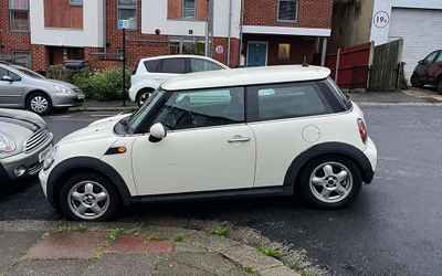 BV08 LPO, a White Mini Cooper parked in Hollingdean