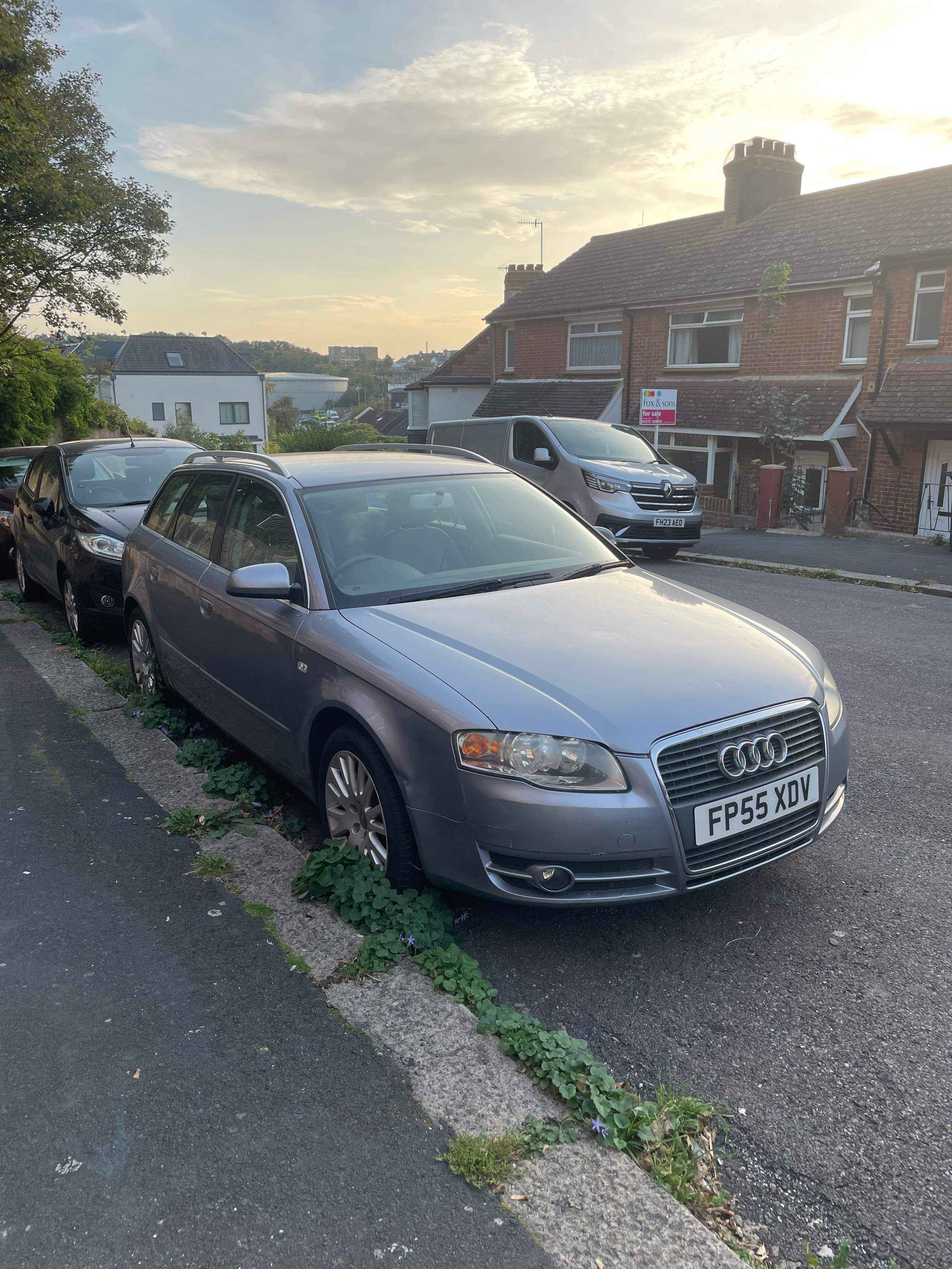 Photograph of FP55 XDV - a Silver Audi A4 parked in Hollingdean by a non-resident, and potentially abandoned. The first of two photographs supplied by the residents of Hollingdean.