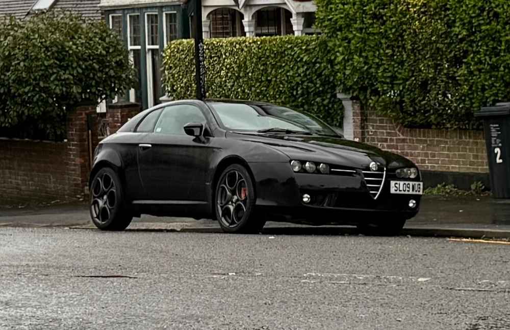 Photograph of SL09 WUB - a Black Alfa Romeo Brera parked in Hollingdean by a non-resident. The twenty-sixth of thirty photographs supplied by the residents of Hollingdean.