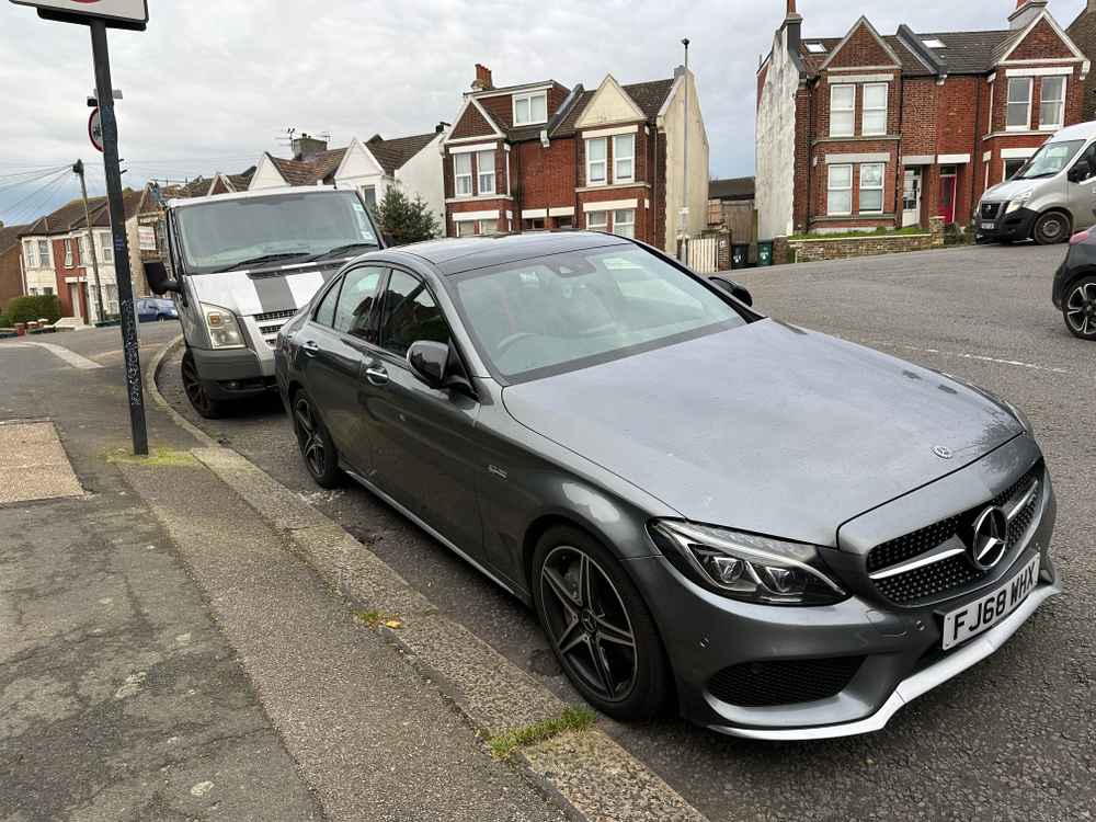 Photograph of FJ68 WHX - a Grey Mercedes C Class parked in Hollingdean by a non-resident. The second of eight photographs supplied by the residents of Hollingdean.