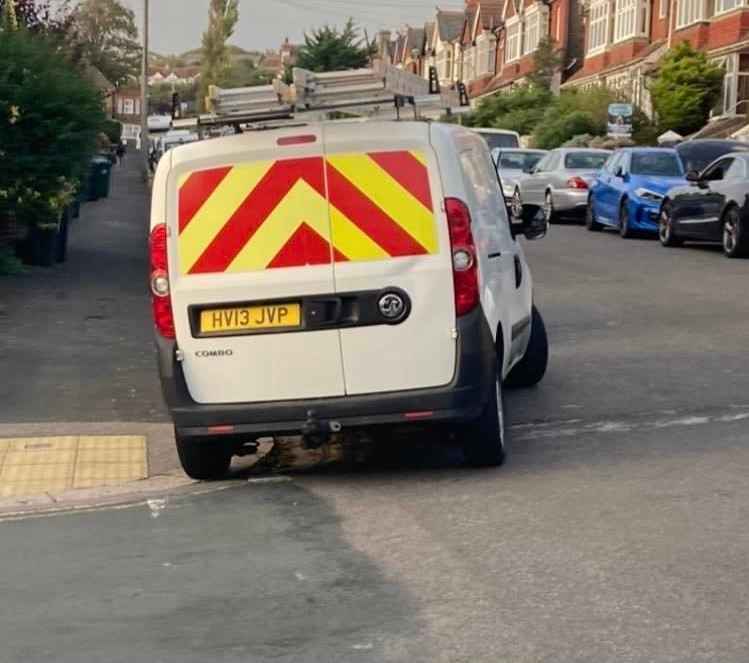 Photograph of HV13 JVP - a White Vauxhall Combo parked in Hollingdean by a non-resident. The first of two photographs supplied by the residents of Hollingdean.