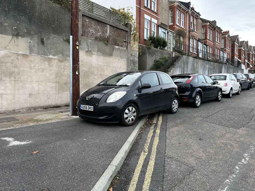 Photograph of GU56 DKX - a Black Toyota Yaris parked in Hollingdean by a non-resident who uses the local area as part of their Brighton commute. The first of three photographs supplied by the residents of Hollingdean.