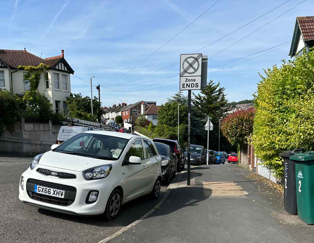 Photograph of GY66 XHV - a White Kia Picanto parked in Hollingdean by a non-resident. The first of five photographs supplied by the residents of Hollingdean.