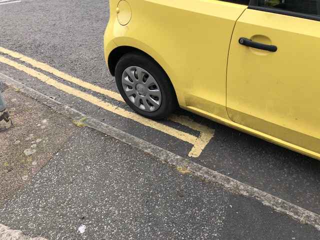 Photograph of HY63 NZU - a Yellow Skoda Citigo parked in Hollingdean by a non-resident. The third of four photographs supplied by the residents of Hollingdean.