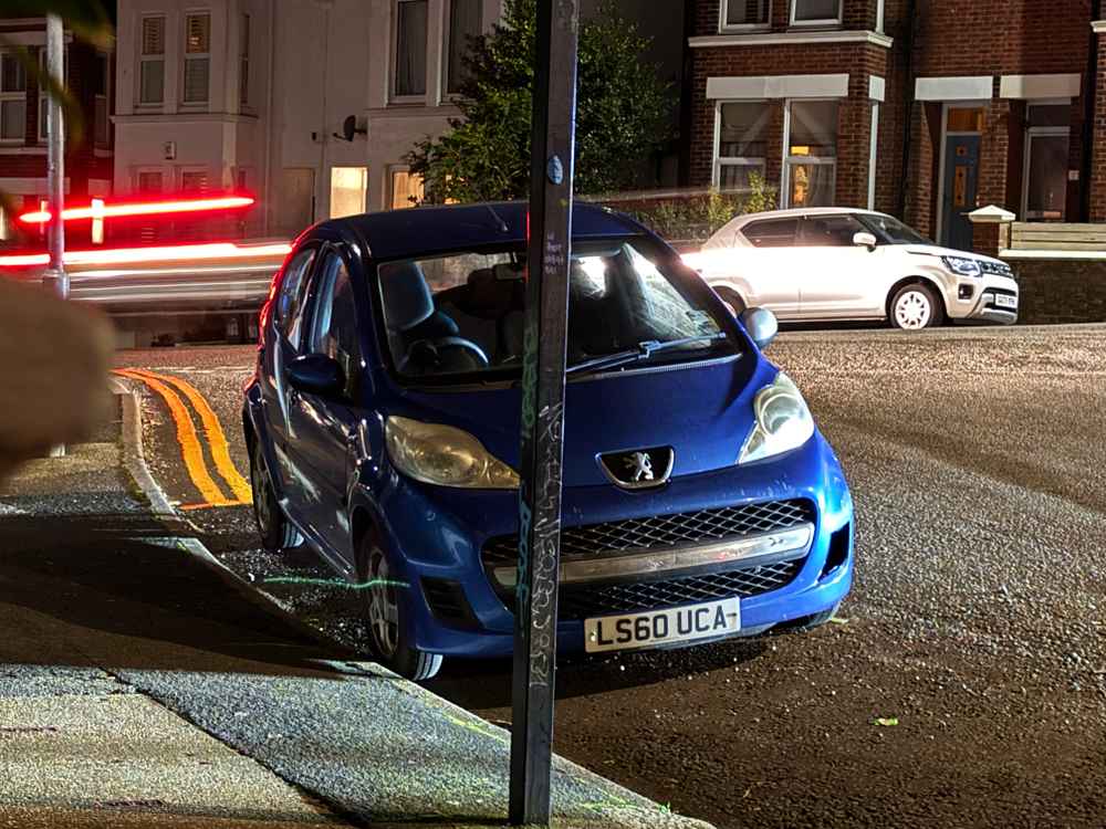 Photograph of LS60 UCA - a Blue Peugeot 107 parked in Hollingdean by a non-resident. The sixteenth of sixteen photographs supplied by the residents of Hollingdean.