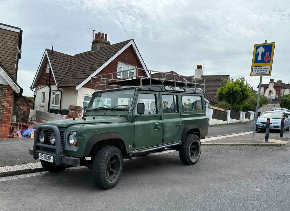 Photograph of R921 ENF - a Green Land Rover Defender parked in Hollingdean by a non-resident. The fourth of six photographs supplied by the residents of Hollingdean.