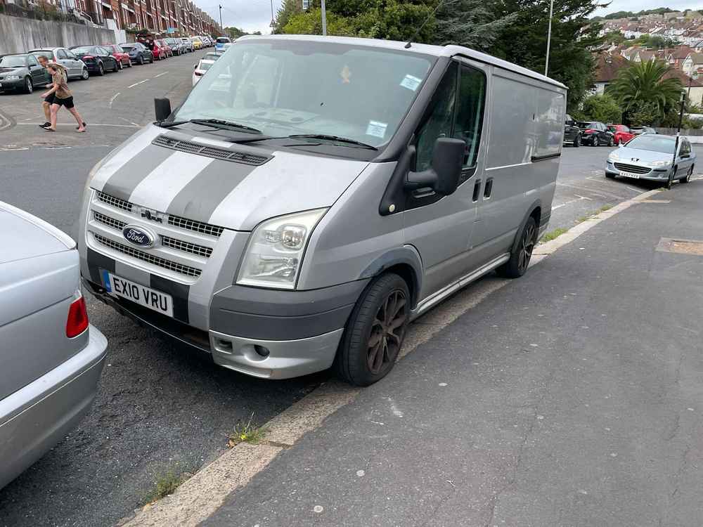 Photograph of EX10 VRU - a Silver Ford Transit parked in Hollingdean by a non-resident. The first of twenty-five photographs supplied by the residents of Hollingdean.