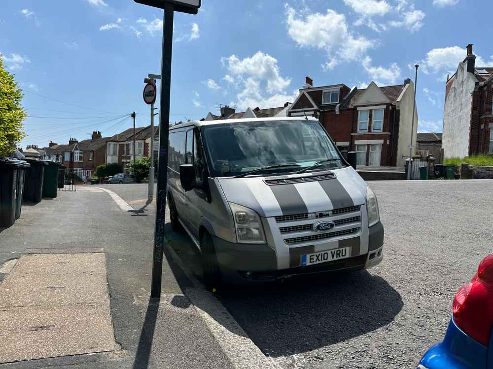 Photograph of EX10 VRU - a Silver Ford Transit parked in Hollingdean by a non-resident. The fourteenth of sixteen photographs supplied by the residents of Hollingdean.