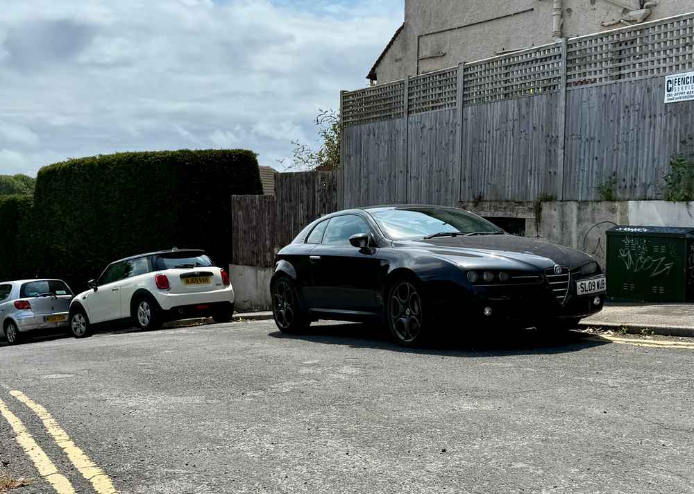 Photograph of SL09 WUB - a Black Alfa Romeo Brera parked in Hollingdean by a non-resident. The thirty-second of thirty-six photographs supplied by the residents of Hollingdean.