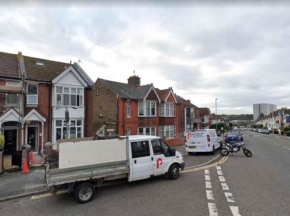 Photograph of Y13 NCE - a white Vauxhall Vivaro parked in Hollingdean by a non-resident. The first of four photographs supplied by the residents of Hollingdean.