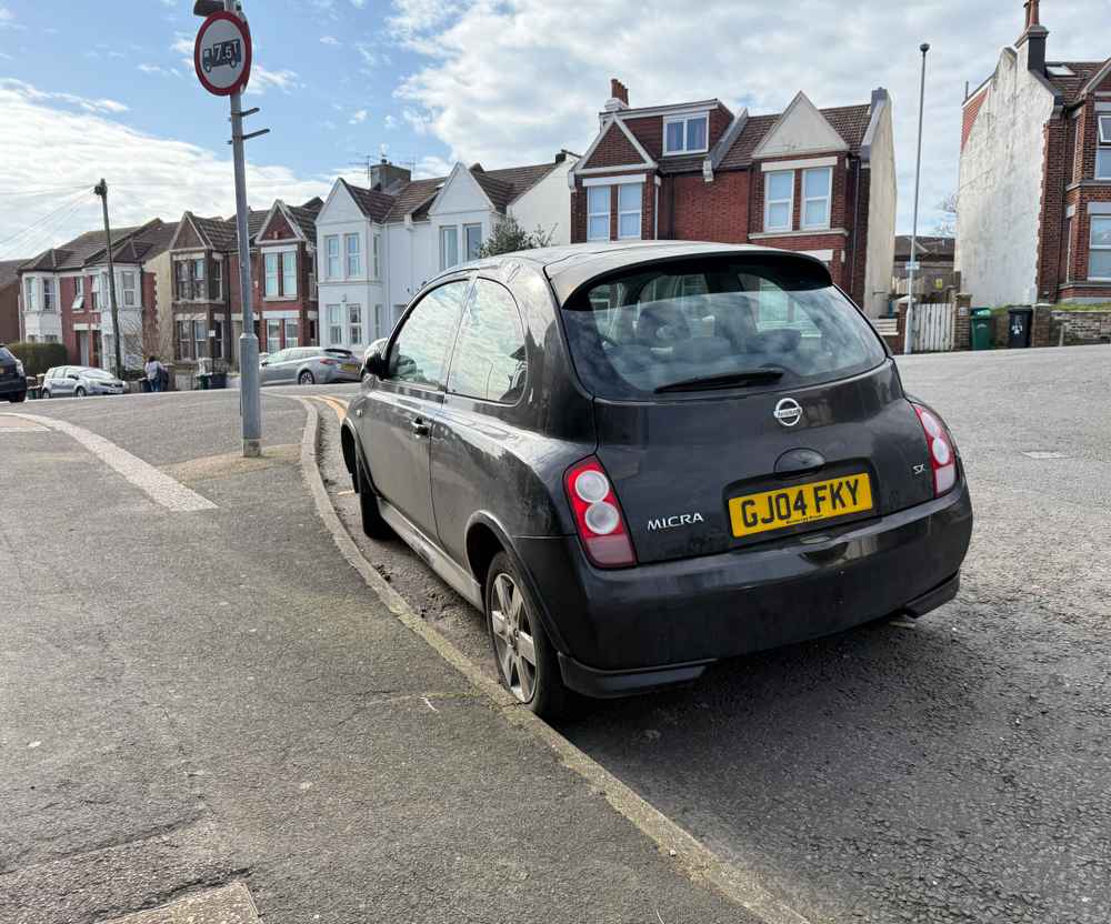 Photograph of GJ04 FKY - a Black Nissan Micra parked in Hollingdean by a non-resident. The fifth of six photographs supplied by the residents of Hollingdean.