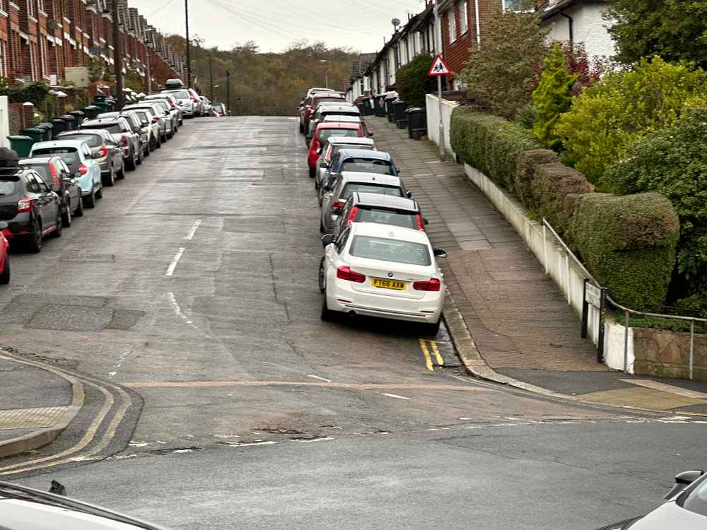 Photograph of FT66 AXW - a White BMW 3 Series parked in Hollingdean by a non-resident who uses the local area as part of their Brighton commute. The fifth of nine photographs supplied by the residents of Hollingdean.