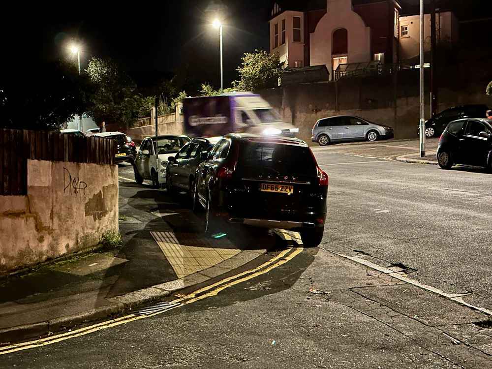 Photograph of DF65 ZZV - a Black Volvo XC60 parked in Hollingdean by a non-resident. The seventh of eleven photographs supplied by the residents of Hollingdean.