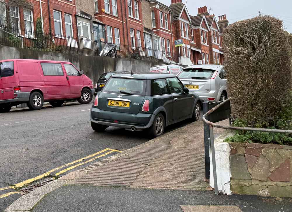 Photograph of GJ06 JUE - a Green Mini Cooper parked in Hollingdean by a non-resident. The eighteenth of eighteen photographs supplied by the residents of Hollingdean.