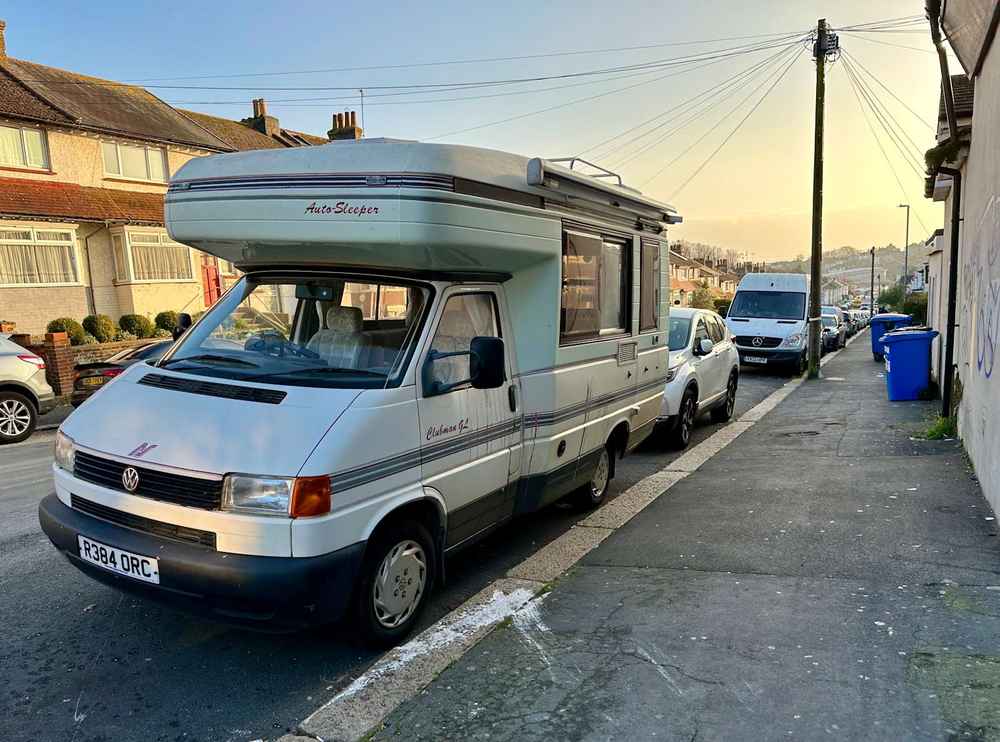 Photograph of R384 ORC - a Beige Volkswagen Transporter camper van parked in Hollingdean by a non-resident, and potentially abandoned. The eleventh of fifteen photographs supplied by the residents of Hollingdean.