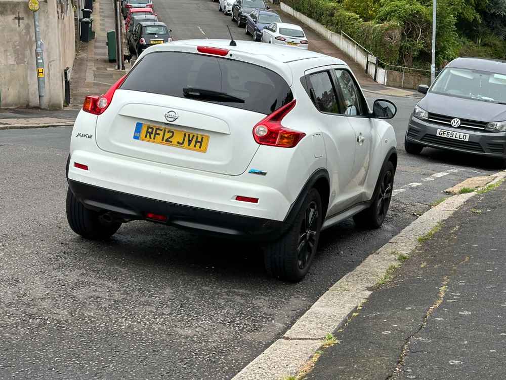 Photograph of RF12 JVH - a White Nissan Juke parked in Hollingdean by a non-resident who uses the local area as part of their Brighton commute. The eighth of eight photographs supplied by the residents of Hollingdean.