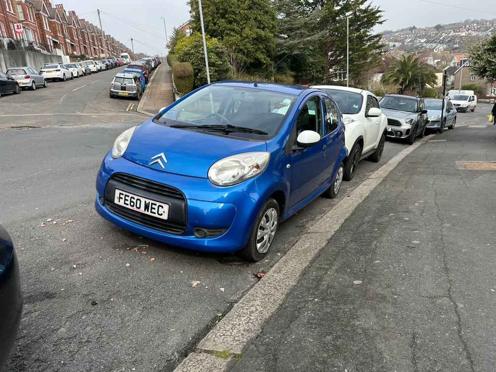 Photograph of FE60 WEC - a Blue Citroen C1 parked in Hollingdean by a non-resident. The twelfth of thirteen photographs supplied by the residents of Hollingdean.