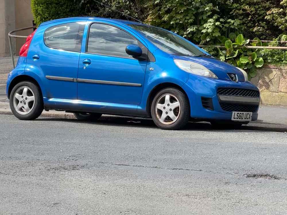 Photograph of LS60 UCA - a Blue Peugeot 107 parked in Hollingdean by a non-resident. The tenth of thirty photographs supplied by the residents of Hollingdean.