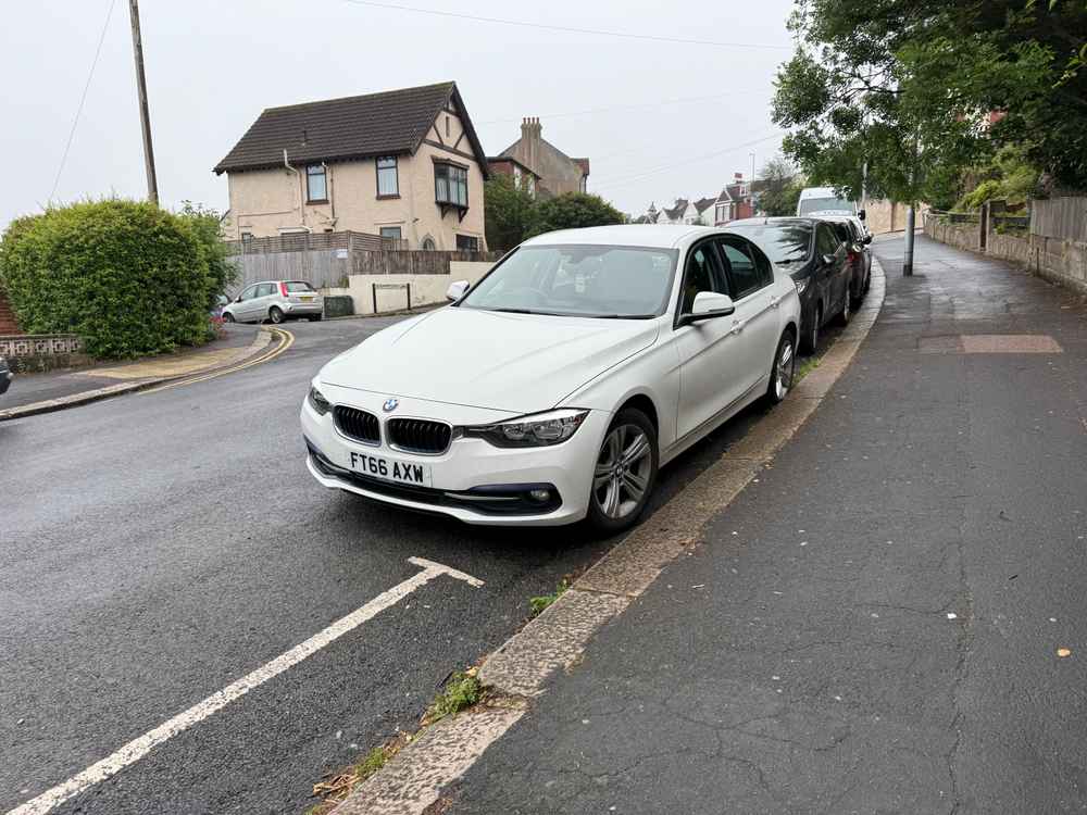 Photograph of FT66 AXW - a White BMW 3 Series parked in Hollingdean by a non-resident who uses the local area as part of their Brighton commute. The seventeenth of seventeen photographs supplied by the residents of Hollingdean.