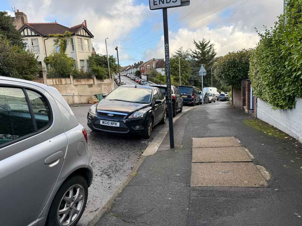 Photograph of WG10 NPK - a Black Ford Focus parked in Hollingdean by a non-resident. The third of three photographs supplied by the residents of Hollingdean.