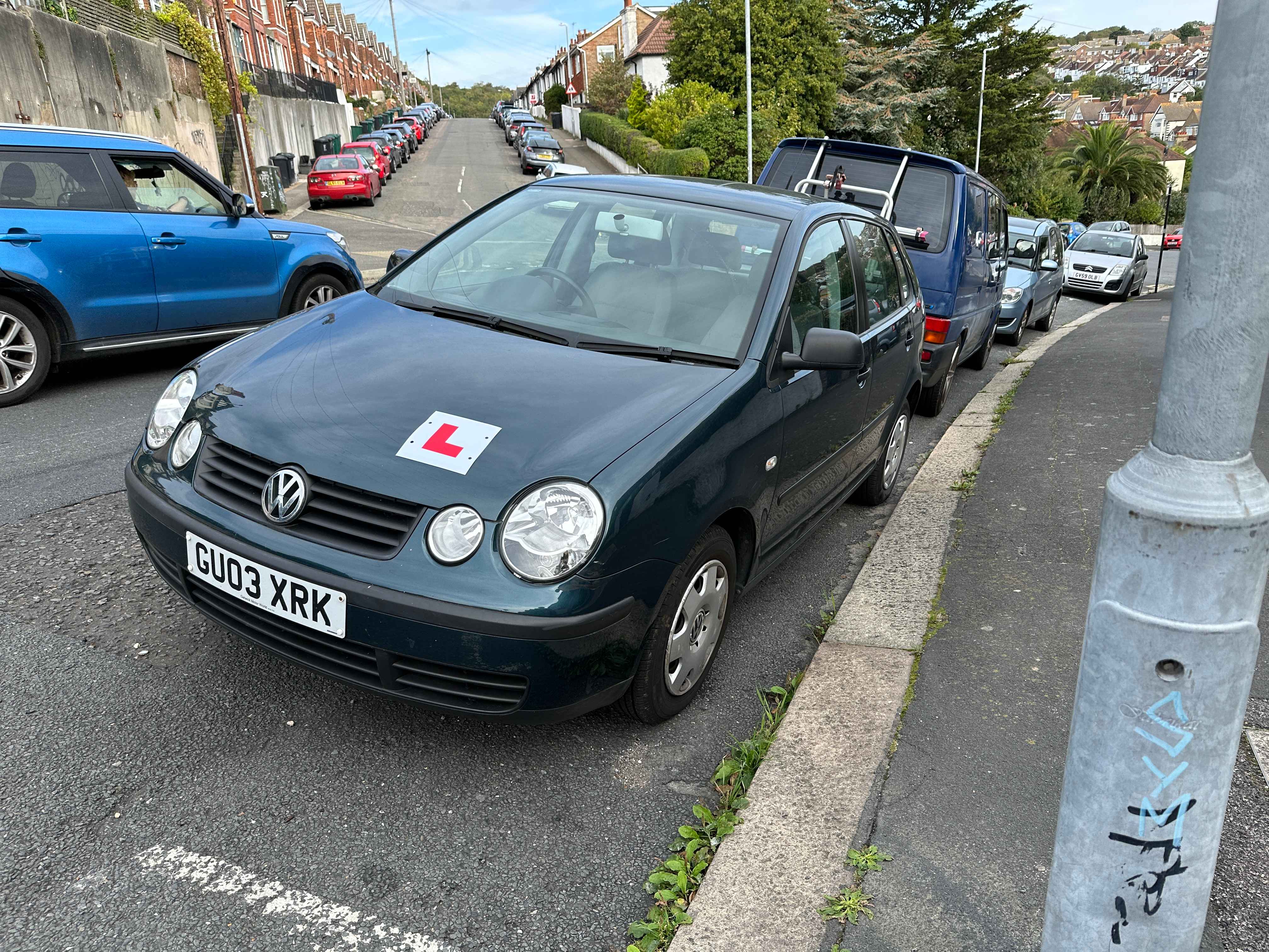 Photograph of GU03 XRK - a Green Volkswagen Polo parked in Hollingdean by a non-resident. The third of eight photographs supplied by the residents of Hollingdean.