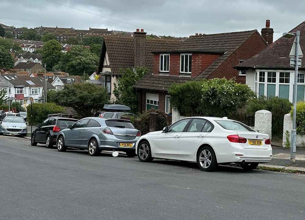 Photograph of FT66 AXW - a White BMW 3 Series parked in Hollingdean by a non-resident who uses the local area as part of their Brighton commute. The eighth of twenty-five photographs supplied by the residents of Hollingdean.